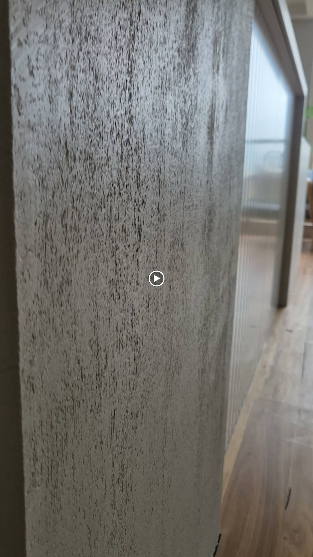 Close-up of hand-burnished Venetian plaster texture