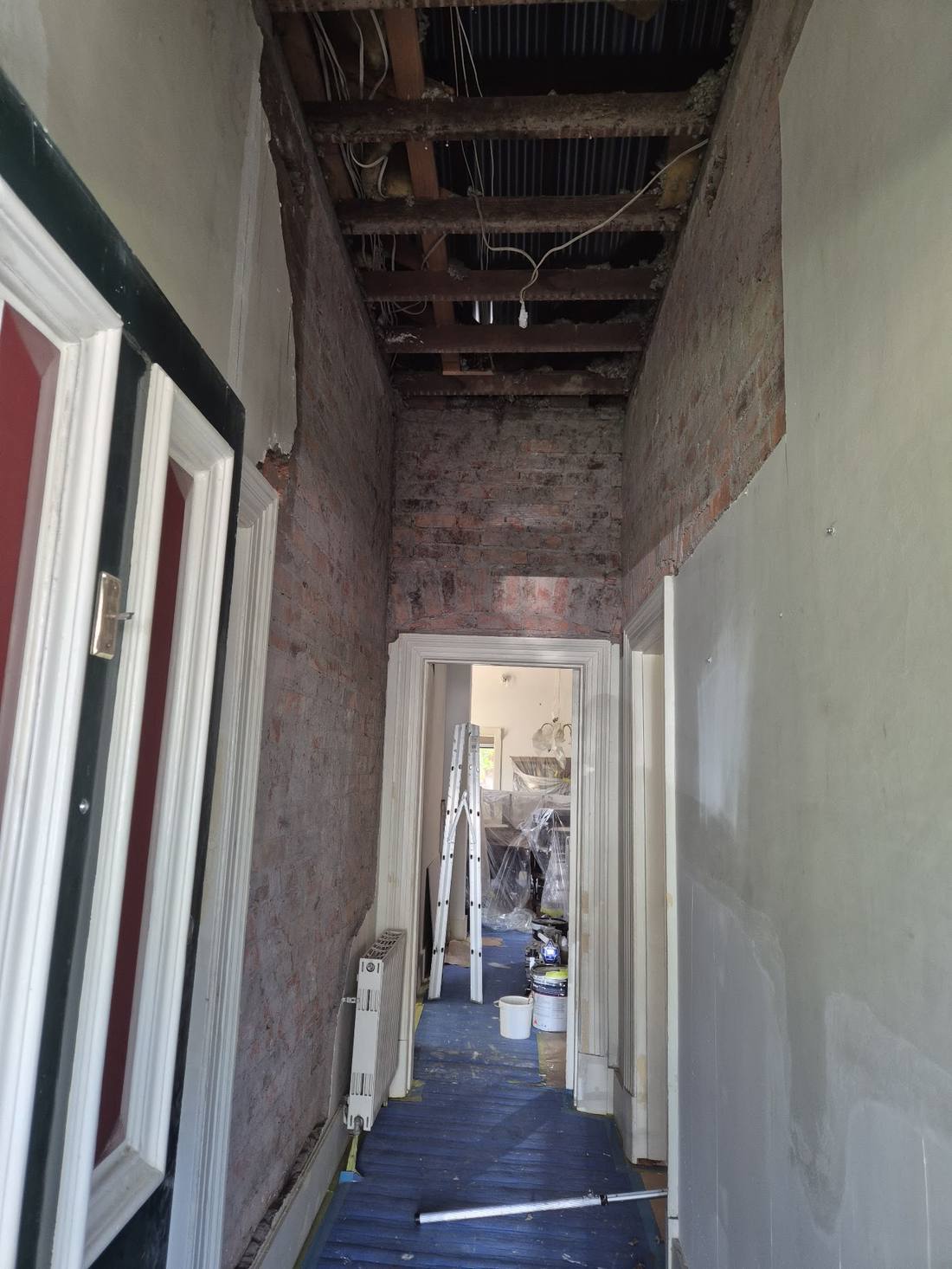 Interior prepared and protected before painting begins