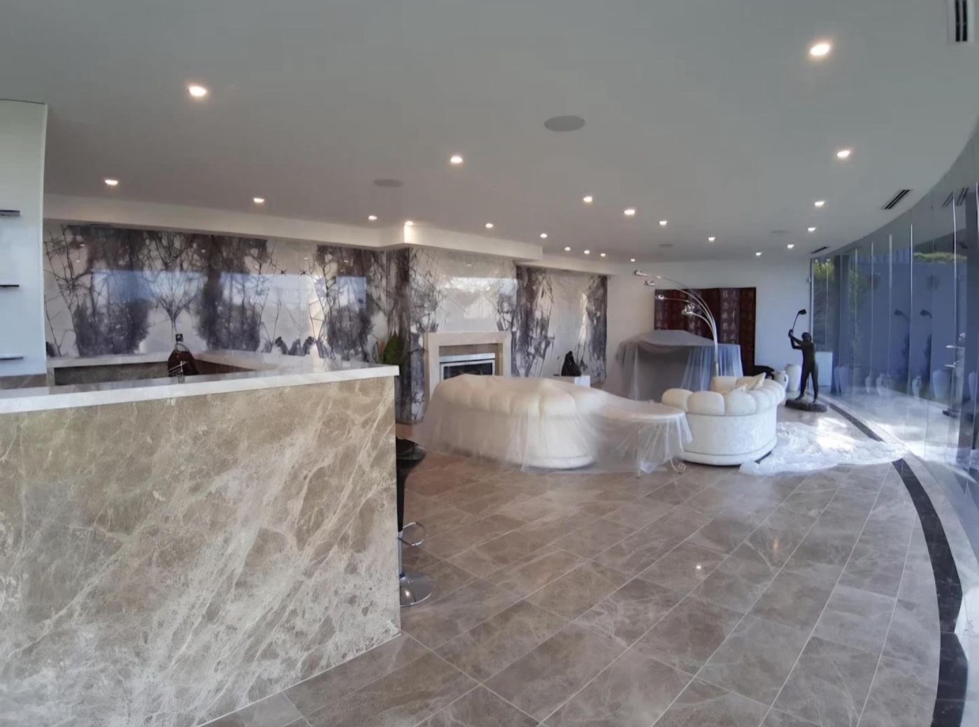 Glen Iris open-plan interior with stone feature wall