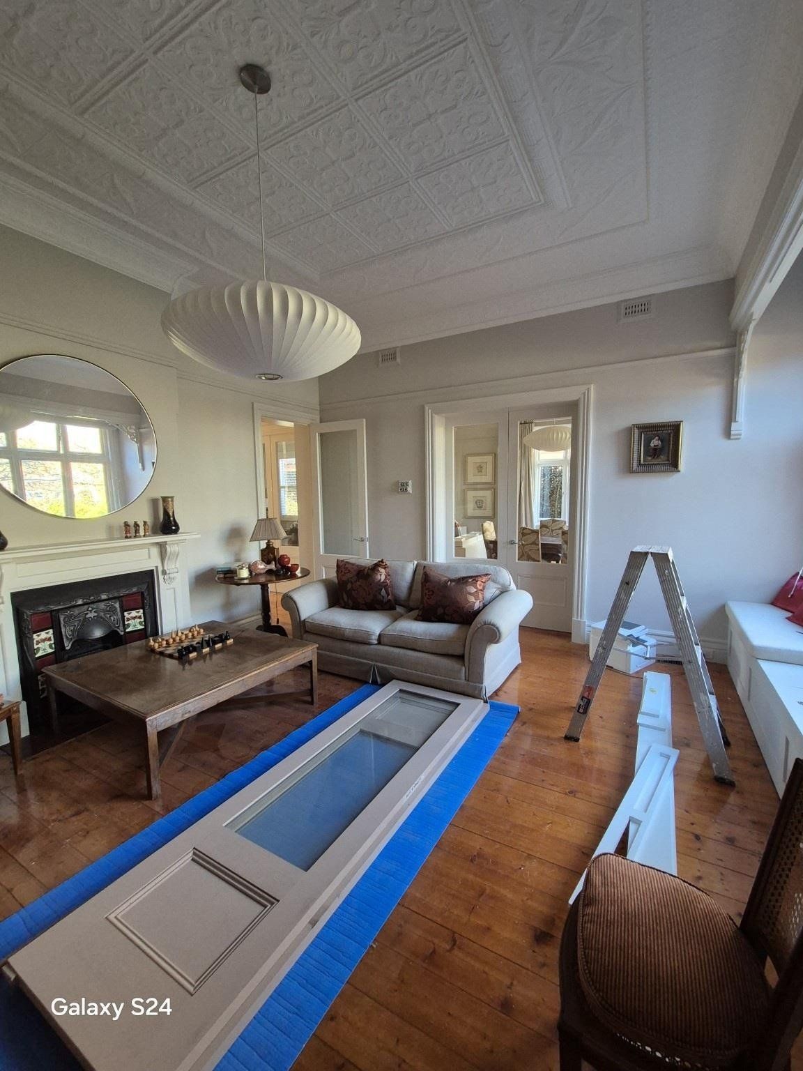Malvern East living room with pressed ceiling